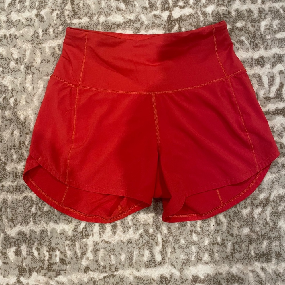 Lululemon Speed Up Shorts Size 0, Tall, Poppy color. Excellent Condition.